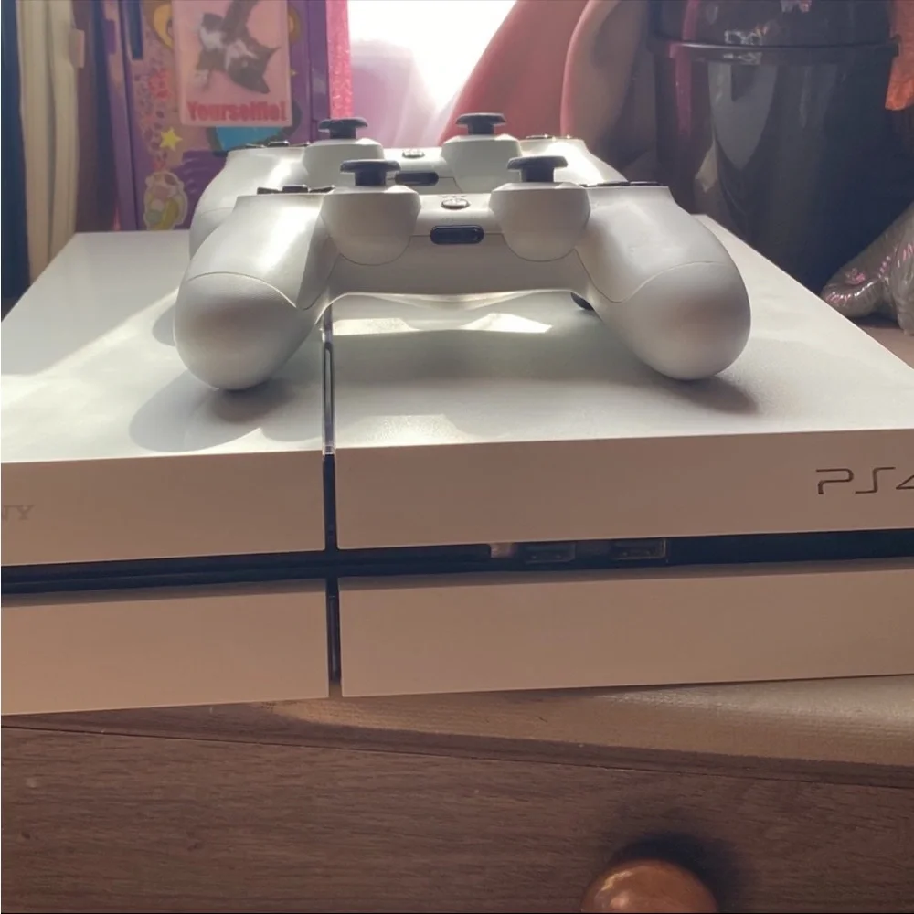 PS4 console with controllers